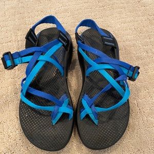 Blue Chacos with criss cross straps